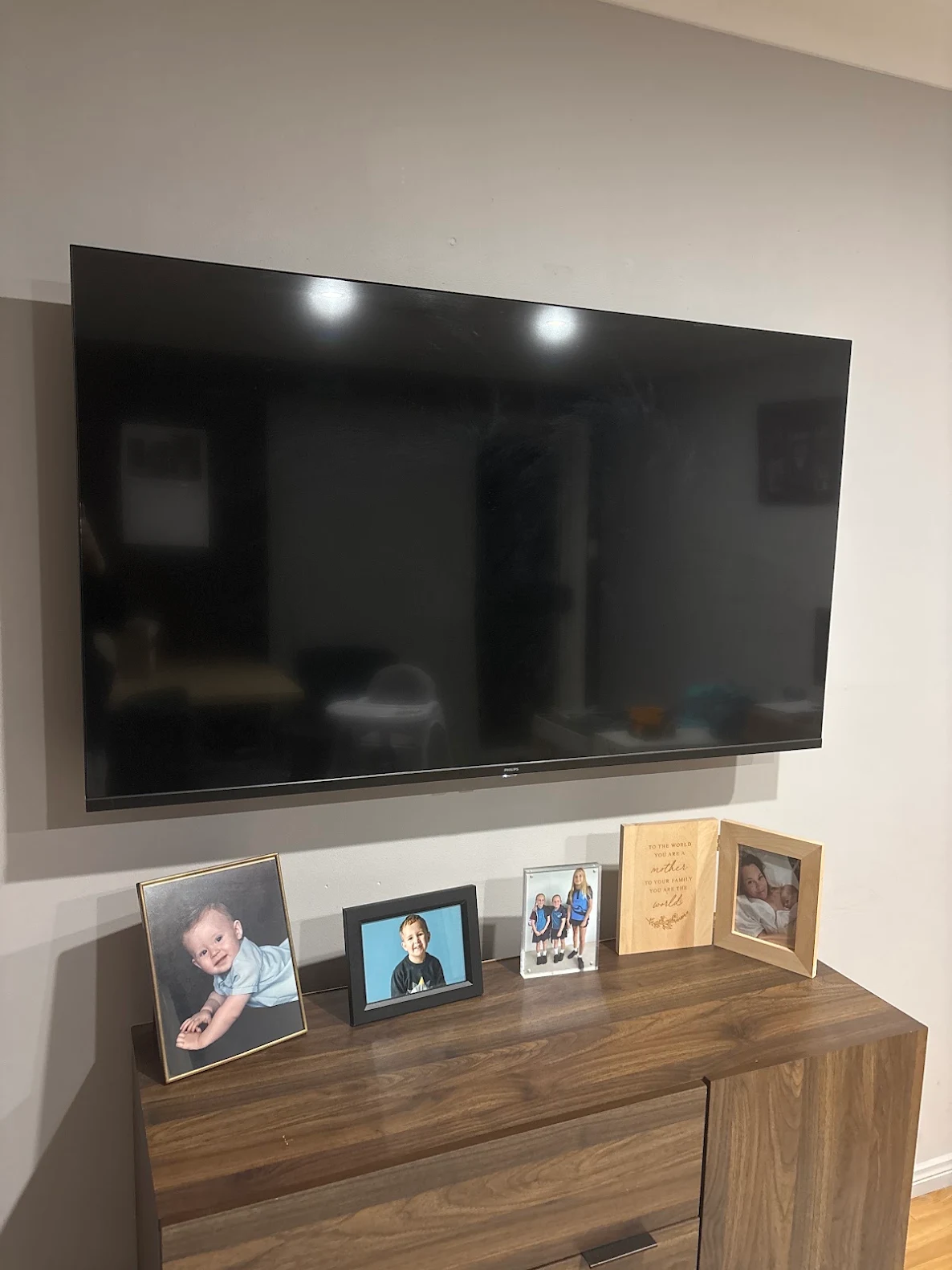 Bedroom TV wall mount installation with tidy cable management